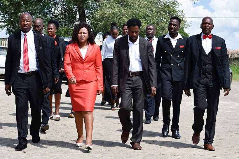 Prophet entering the church